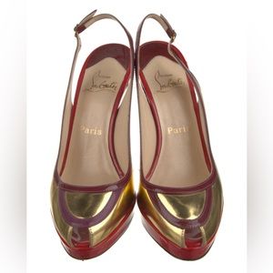 Christian Louboutin colorblock slingback pumps with peep toes.